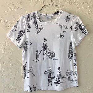 Scoop neck, short sleeve, 100%cotton cultural theme tee.